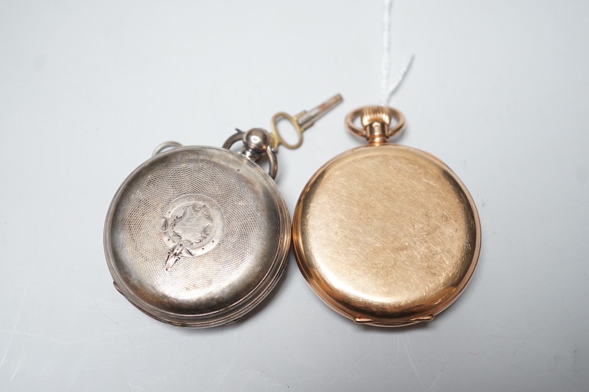 A George V J.W. Benson 9ct gold open faced pocket watch (a.f.), with interior personalised inscription, case diameter 48mm, gross weight 85.7 grams, together with a late Victorian silver open faced pocket watch.